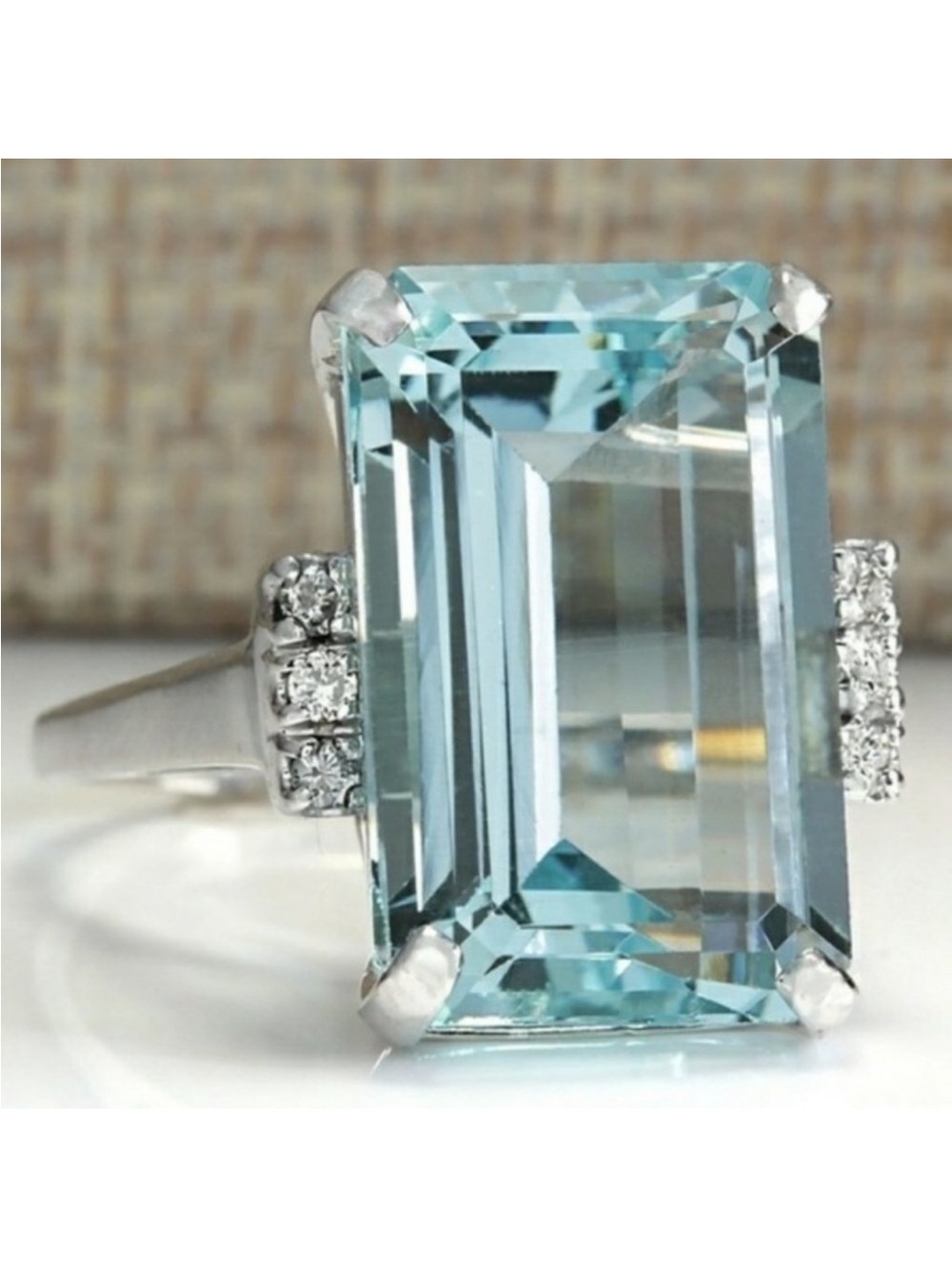 Light Blue Emerald-Cut Gemstone Cocktail Ring with Side Accents